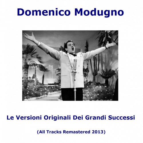 Image of Domenico Modugno leafs through a magazine